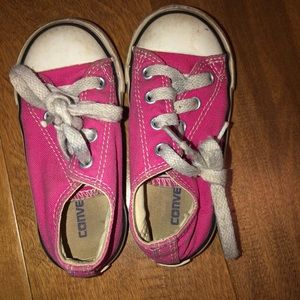 Bright pink converse